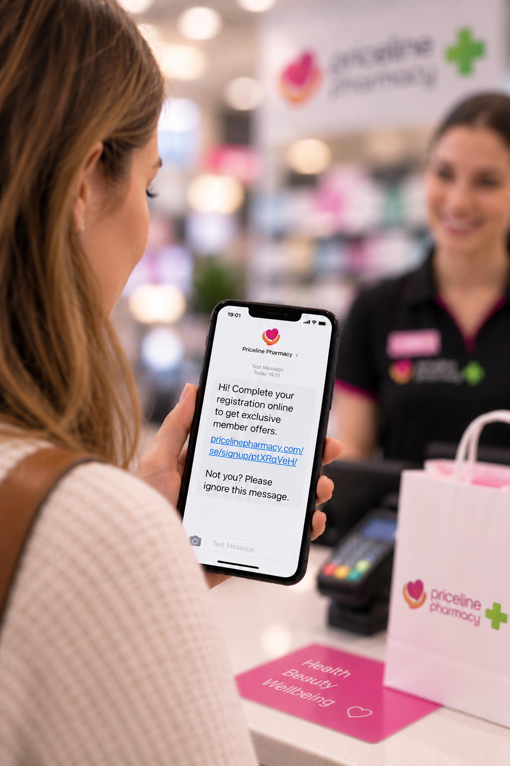 Membership registration link in an SMS on a customer's phone